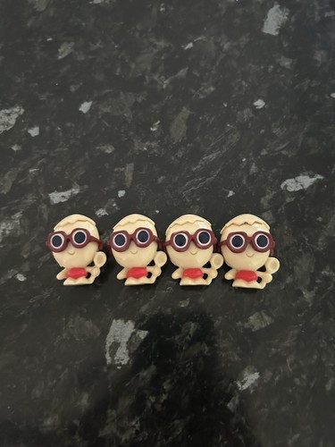 Four yolka moshling figures - yolka,